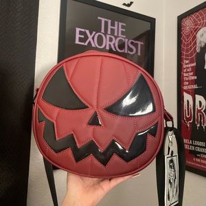 New wine and black vinyl love pain and stitches pumpkin bag